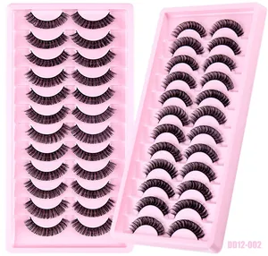 Detail view of 20 pairs high-volume Russian curl DD faux mink eyelashes in two pink trays