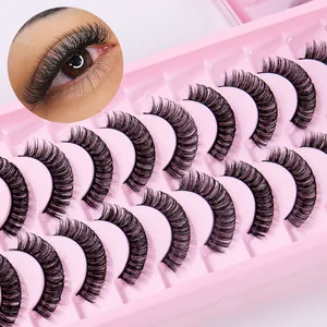 12 pairs of fluffy Russian curl faux mink eyelashes in a clear pink tray for a bold volume look