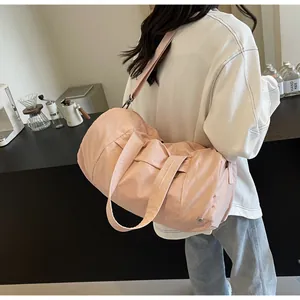 Borsa da viaggio rosa in nylon impermeabile con tracolla rimovibile a tracolla sport