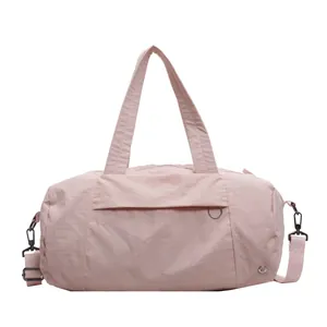 Borsa da viaggio rosa in nylon impermeabile con tracolla e grande capienza