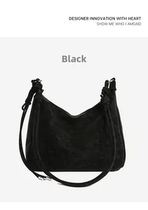 Detail view of the black frosted texture leather shoulder bag with knot decoration