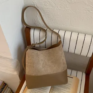 Vintage khaki suede and leather bucket tote bag with adjustable shoulder strap