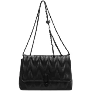 Quilted black leather chain bag with wave stitch pattern and metal ball detail