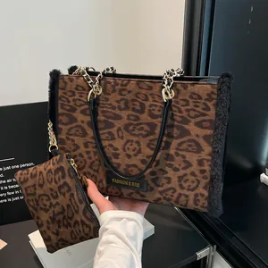 Leopard print tote bag with plush trim and gold chain strap including small coin purse