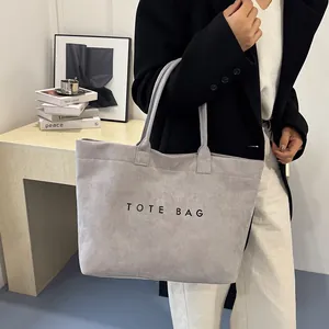 Gray suede tote bag for women featuring a minimalist TOTE BAG print and large capacity