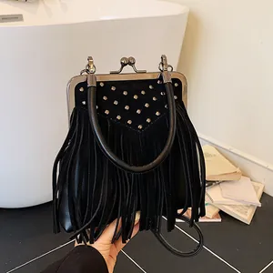Retro black fringe handbag with silver studs and metal clasp closure in vintage style