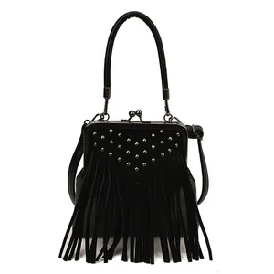 Vintage black crossbody bag with silver V-shaped studs and stylish long fringe details