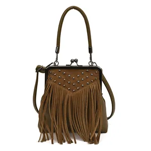 Vintage olive green handbag with metallic studs, long tassels and top-handle design