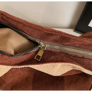 Detail of vintage copper zipper and dual-tone corduroy texture on large tote bag