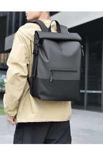 Side view of a large roll-top backpack in dark grey waterproof fabric for daily commute
