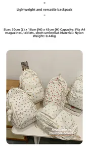 Detail view of five nylon backpacks with fruit prints showing size 30x18x43cm and A4 capacity