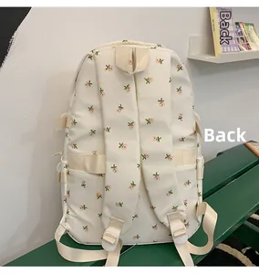 Back view of a cream floral backpack featuring adjustable straps and rose print patterns