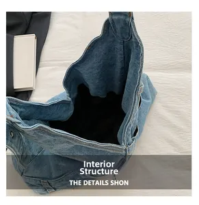 Internal structure showing spacious blue denim tote bag with black lining and large capacity
