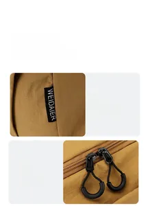 Detail of waterproof nylon fabric with brand logo and smooth zipper with U-shaped pullers