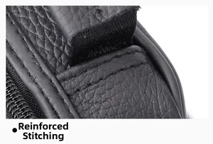 Detailansicht der verstärkten Nähte und Lychee-Ledertextur an der schwarzen Herrentasche