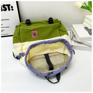 Detail of multi-color drawstring backpack with built-in laptop compartment and padded strap
