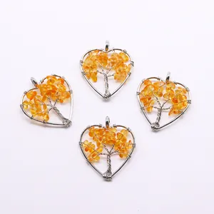 Detailed wire-wrapped heart pendants with orange crystal chips and silver tree of life motif