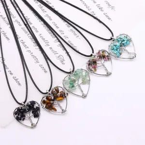 Handmade heart-shaped Tree of Life pendants with natural stones on black cord necklaces