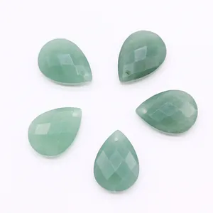 Detail view of five faceted green aventurine teardrop pendants with pre-drilled holes