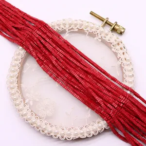 Detailed view of red cube-shaped turquoise beads for DIY jewelry and necklace making