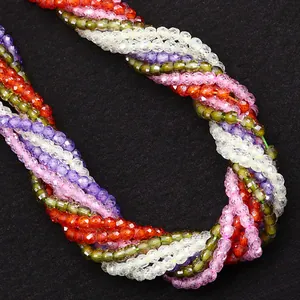 Collar de múltiples hilos trenzados con piedras naturales facetadas y cuentas de circón