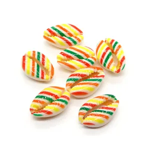 Close-up of colorful striped shell-shaped beads for DIY jewelry making