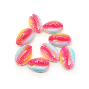 Macro detail of rainbow gradient shell beads with natural serrated edges for DIY jewelry