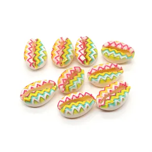 Set of eight natural shell beads with colorful zigzag hand-painted patterns for DIY jewelry