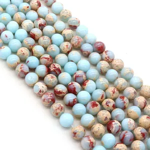 Blue and brown emperor stone round beads for DIY jewelry making displayed in strands