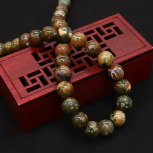 Fil de perles rondes en pierre naturelle Unakite pour création bijoux sur support bois
