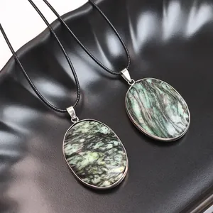 Set of natural oval stone pendants with unique marble texture and black necklaces