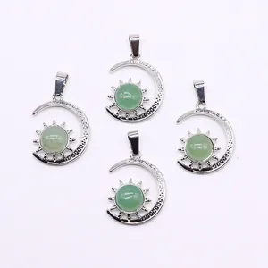 Set of four silver celestial pendants featuring green natural stone and moon sun motifs