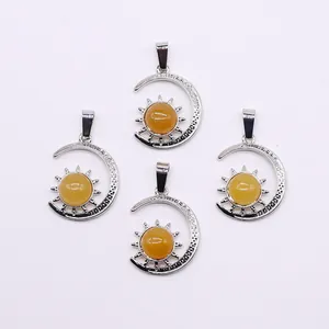 Detailed set of silver sun and moon pendants with centered yellow gemstones for DIY necklaces