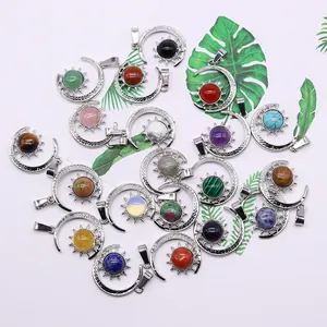 Set of celestial sun and crescent moon pendants with diverse natural gemstones and silver base