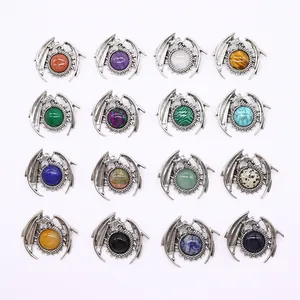 Silver dragon wing necklaces set with 16 colorful natural stone pendants on white background