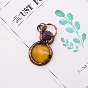 Vintage bronze pendant with natural yellow agate, purple crystal, and rose relief detail