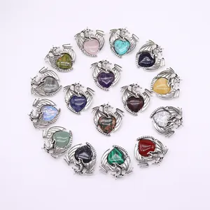 Collection of 15 heart-shaped natural stone pendants with silver dragon-wrapped engraving