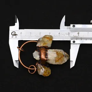 Detailed measurement of a raw citrine crystal pendant showing a width of 50mm