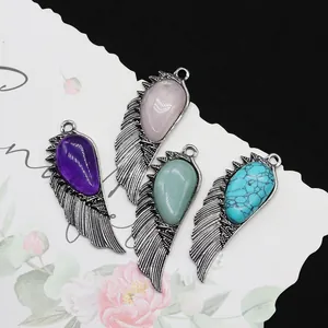 Set of four antique silver wing pendants with amethyst and natural stones for necklaces