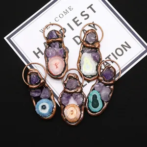 Set of five bohemian natural stone pendants with amethyst and colorful agate slices