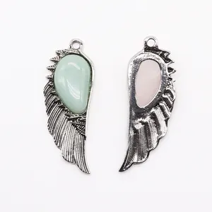 Natural wing pendants in rose quartz and green aventurine with vintage silver finish