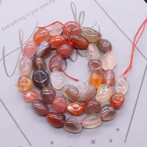 Gepolijste onregelmatige natuurlijke agaatkralen met gekleurde strepen voor DIY-sieraden