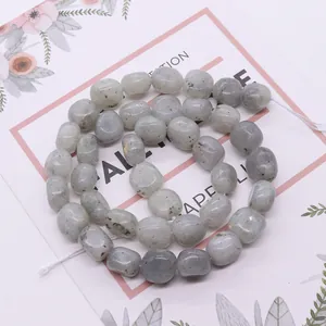 Natural labradorite nugget beads for DIY jewelry making on decorative floral card