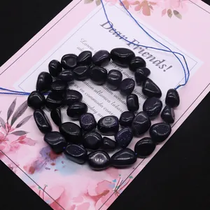 Perles en grès bleu irrégulières pour la création de bijoux sur carte fleurie