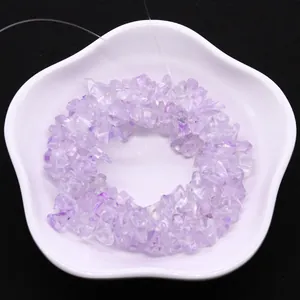 Irregular lavender amethyst crystal stone chips for DIY jewelry making on white tray