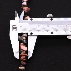 Macro detail of natural irregular pink stone beads measured at 8mm with a caliper