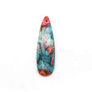 Macro view of teardrop stone pendant with colorful Imperial Jasper mosaic patterns