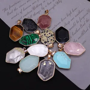 Natural gemstone shield pendants with gold electroplated borders and faceted crystal stones
