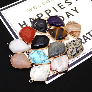 Natural shield-shaped stone pendants with gold-plated edges and diverse textures