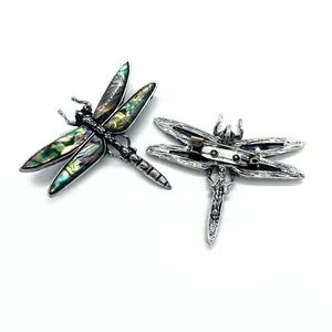 Vintage dragonfly brooch with abalone shell inlay and antique silver finish details